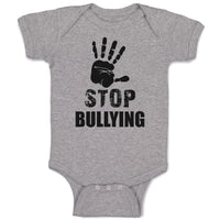 Baby Clothes Stop Bullying Sign and Social Problems of Humanity with Handprint