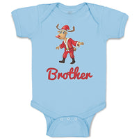 Baby Clothes Brother and A Deer in An Christmas Santa Claus's Costume with Horns