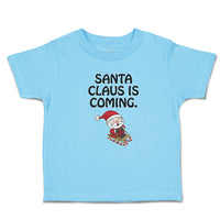 Toddler Clothes Santa Claus Is Coming with Snow Riding Stick Toddler Shirt