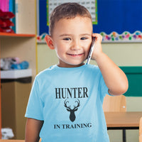 Hunter in Training with Silhouette Deer Head and Horns